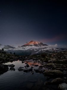 Preview wallpaper volcano, snow, snowy, stones, lake