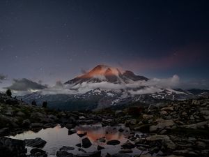 Preview wallpaper volcano, snow, snowy, stones, lake