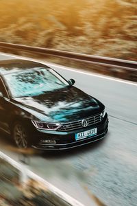 Preview wallpaper volkswagen, car, black, business class, road, asphalt, movement