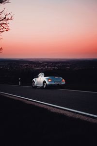 Preview wallpaper volkswagen, car, road, lights