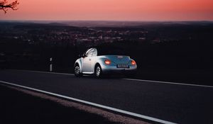 Preview wallpaper volkswagen, car, road, lights