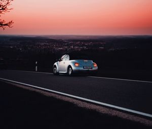 Preview wallpaper volkswagen, car, road, lights