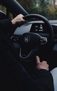 Preview wallpaper volkswagen, car, steering wheel, driver, hands