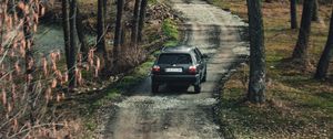 Preview wallpaper volkswagen, car, suv, black, road, forest