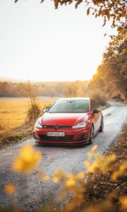 Preview wallpaper volkswagen golf gti, volkswagen, car, red, front view, road, nature