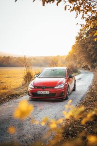 Preview wallpaper volkswagen golf gti, volkswagen, car, red, front view, road, nature