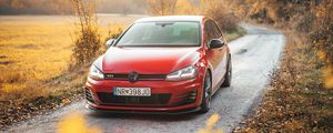 Preview wallpaper volkswagen golf gti, volkswagen, car, red, front view, road, nature