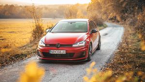 Preview wallpaper volkswagen golf gti, volkswagen, car, red, front view, road, nature