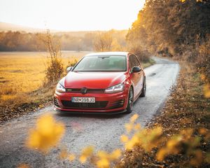 Preview wallpaper volkswagen golf gti, volkswagen, car, red, front view, road, nature