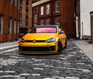 Preview wallpaper volkswagen golf, volkswagen, car, front view, yellow