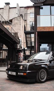 Preview wallpaper volkswagen golf, volkswagen, car, black, buildings