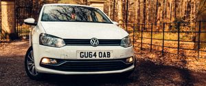 Preview wallpaper volkswagen polo, volkswagen, car, white, trees