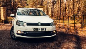 Preview wallpaper volkswagen polo, volkswagen, car, white, trees