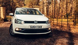 Preview wallpaper volkswagen polo, volkswagen, car, white, trees