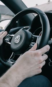 Preview wallpaper volkswagen, steering wheel, hands, car