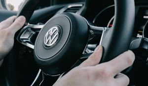 Preview wallpaper volkswagen, steering wheel, hands, car