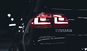 Preview wallpaper volkswagen tiguan, volkswagen, car, black, rear view, lights, backlight