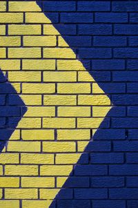 Preview wallpaper wall, brick, arrow, blue, yellow, pointer, direction