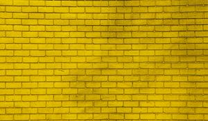 Preview wallpaper wall, brick, yellow, paint, texture