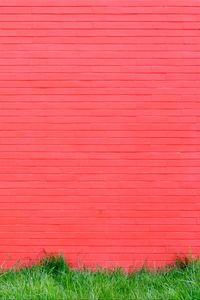 Preview wallpaper wall, grass, pink, bricks
