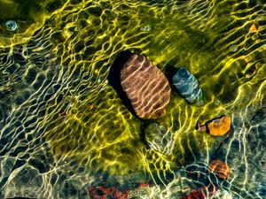 Preview wallpaper water, bottom, glare, stones