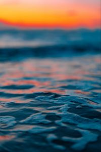 Preview wallpaper water, bubbles, blur, sea, horizon, sunset