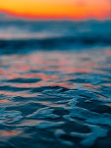 Preview wallpaper water, bubbles, blur, sea, horizon, sunset