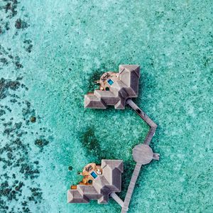 Preview wallpaper water, bungalow, aerial view, ocean, pier