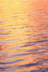 Preview wallpaper water, glare, ripples, sunset, waves