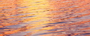 Preview wallpaper water, glare, ripples, sunset, waves
