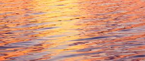 Preview wallpaper water, glare, ripples, sunset, waves