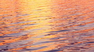 Preview wallpaper water, glare, ripples, sunset, waves