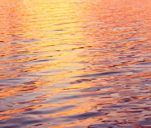Preview wallpaper water, glare, ripples, sunset, waves