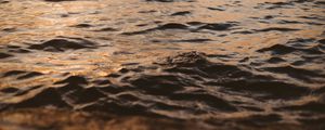 Preview wallpaper water, glare, waves, wavy, ripples, sunset