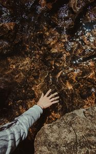 Preview wallpaper water, hand, stones, touch, transparent