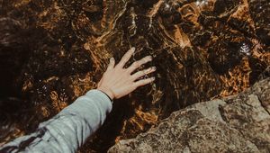 Preview wallpaper water, hand, stones, touch, transparent