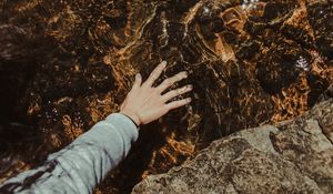 Preview wallpaper water, hand, stones, touch, transparent