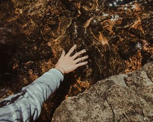 Preview wallpaper water, hand, stones, touch, transparent