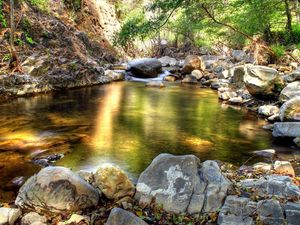 Preview wallpaper water, lake, stones, gleams