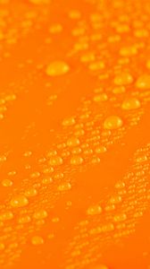 Preview wallpaper water, liquid, drops, macro, orange