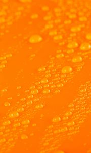 Preview wallpaper water, liquid, drops, macro, orange