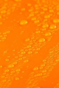Preview wallpaper water, liquid, drops, macro, orange