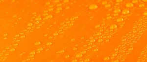 Preview wallpaper water, liquid, drops, macro, orange