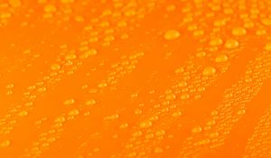 Preview wallpaper water, liquid, drops, macro, orange