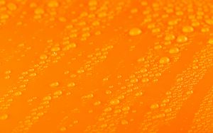Preview wallpaper water, liquid, drops, macro, orange
