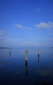 Preview wallpaper water, pillars, horizon, sky, reflection