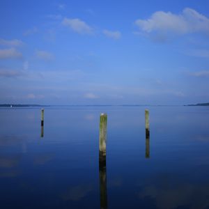 Preview wallpaper water, pillars, horizon, sky, reflection