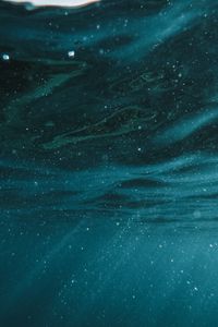 Preview wallpaper water, rays, bubbles, dark
