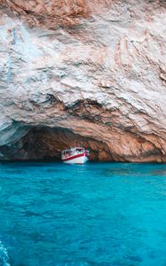 Preview wallpaper water, rock, boat, sea, bay, cave