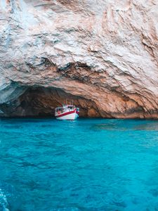 Preview wallpaper water, rock, boat, sea, bay, cave